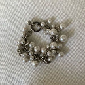 Pearl and silver charm bracelet